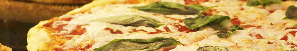 Eating Italian Pizza at Dusal's Italian Restaurant and Pizzeria restaurant in Manalapan Township, NJ.